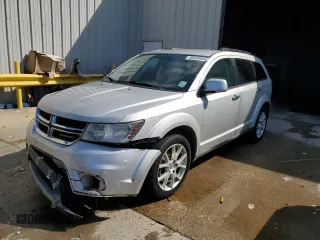 2013 Dodge Journey Crew with VIN 3C4PDCDG5DT659566, listed as a Copart auction lot 58930885 with 160,261 mi miles and Salvage title. Bid and sale history available at DreamBid. Image 1.