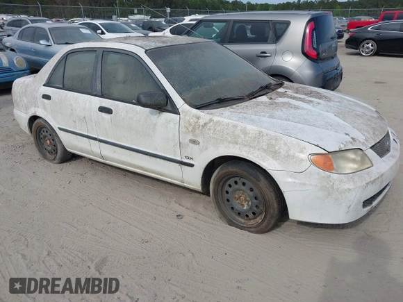2003 Mazda Protege DX with VIN JM1BJ225730146488, listed as a IAAI auction lot 42086747 with Not Provided miles and . Bid and sale history available at DreamBid. Image 1.