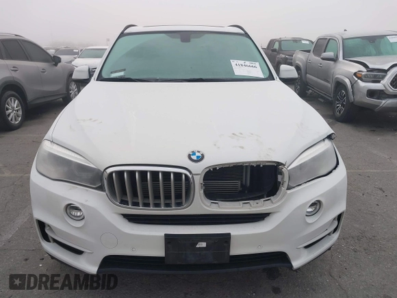 2016 BMW X5 xDrive40e with VIN 5UXKT0C59G0S79593, listed as a IAAI auction lot 41846666 with 57,178 mi miles and . Bid and sale history available at DreamBid. Image 12.