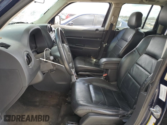 2014 Jeep Patriot High Altitude with VIN 1C4NJPFA3ED676843, listed as a Copart auction lot 49769215 with 122,606 mi miles and Salvage Title. Bid and sale history available at carsss.com. Image 7.