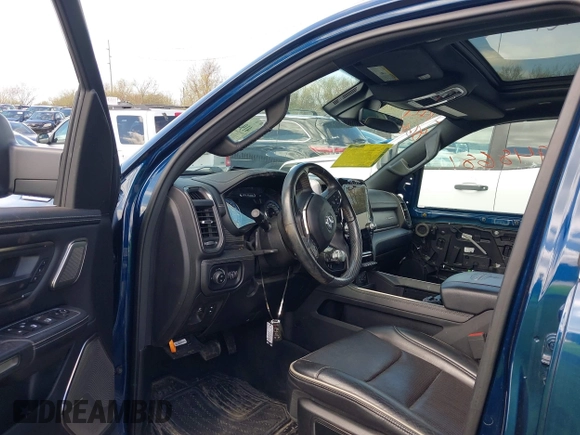 2021 Ram 1500 Limited with VIN 1C6SRFHT1MN578723, listed as a IAAI auction lot 41948681 with 75,715 mi miles and . Bid and sale history available at DreamBid. Image 5.