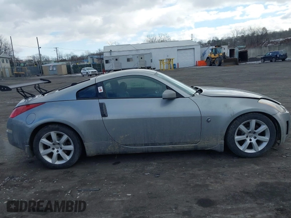 2005 Nissan 350Z Touring with VIN JN1AZ34E85M652465, listed as a IAAI auction lot 41418161 with 153,099 mi miles. Bid and sale history available at carsss.com. Image 13.