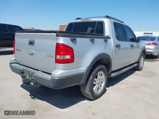 2010 Ford Explorer Sport Trac XLT with VIN 1FMEU3BE2AUA00236, listed as a IAAI auction lot 41981531 with 101,993 mi miles. Bid and sale history available at carsss.com. Image 4.