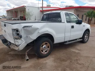 2005 Ford F-150 XL with VIN 1FTRF12W05NB36068, listed as a IAAI auction lot 41732744 with 203,261 mi miles. Bid and sale history available at carsss.com. Image 4.