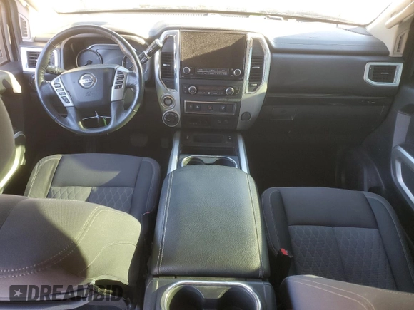 2021 Nissan Titan SV z VIN 1N6AA1FB8MN504530, wystawiony jako Copart lot #80914794 z przebiegiem 103 771 mil mil oraz Szkoda całkowita • Salvage title. Historia ofert i sprzedaży dostępna na DreamBid. Obrazek 8.