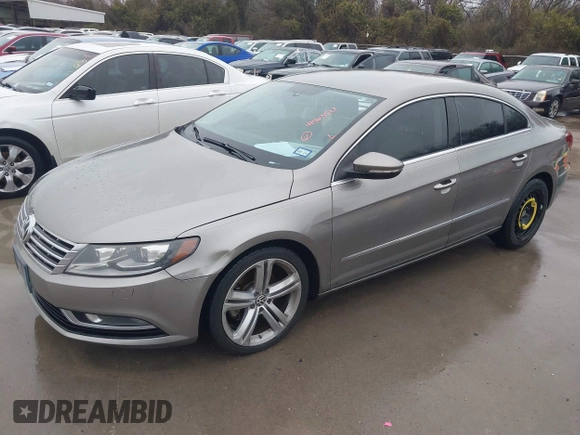 2013 Volkswagen CC Sport with VIN WVWBN7AN5DE514299, listed as a IAAI auction lot 41563521 with 199,249 mi miles. Bid and sale history available at carsss.com. Image 2.