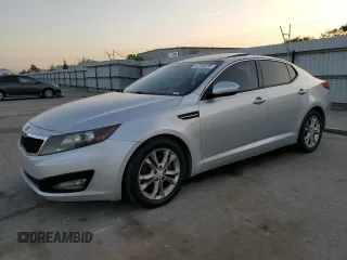 2012 Kia Optima EX with VIN 5XXGN4A7XCG037286, listed as a Copart auction lot 52386335 with 114,750 mi miles and Salvage Title. Bid and sale history available at carsss.com. Image 1.
