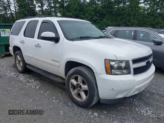 2007 Chevrolet Tahoe LT z VIN 1GNFC13007R415013, wystawiony jako IAAI lot #42370633 z przebiegiem 302 992 mil mil oraz . Historia ofert i sprzedaży dostępna na DreamBid. Obrazek 1.