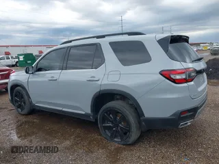 2024 Honda Pilot Touring z VIN 5FNYG1H71RB005034, wystawiony jako IAAI lot #42371878 z przebiegiem Nie podano mil oraz . Historia ofert i sprzedaży dostępna na DreamBid. Obrazek 13.