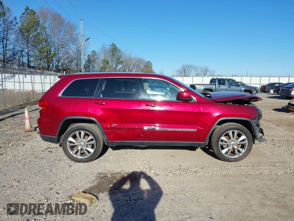 2013 Jeep Grand Cherokee Laredo with VIN 1C4RJEAG3DC631987, listed as a IAAI auction lot 41240182 with 186,193 mi miles. Bid and sale history available at carsss.com. Image 14.