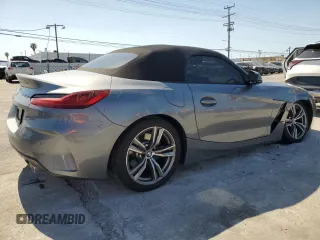 2024 BMW Z4 sDrive30i with VIN WBAHF3C06RWY36286, listed as a Copart auction lot 50296565 with 9,898 mi miles and Salvage title. Bid and sale history available at DreamBid. Image 3.