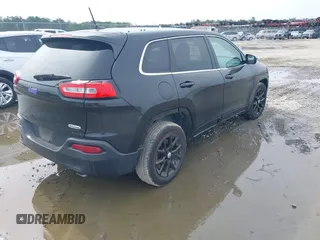 2014 Jeep Cherokee Latitude with VIN 1C4PJLCS4EW106479, listed as a IAAI auction lot 42283214 with 179,029 mi miles and . Bid and sale history available at DreamBid. Image 4.