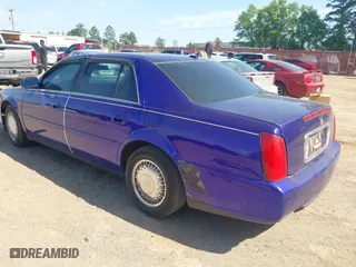 2005 Cadillac DeVille with VIN 1G6KD54Y95U214904, listed as a IAAI auction lot 42014527 with 144,207 mi miles. Bid and sale history available at carsss.com. Image 3.