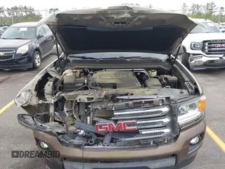 2015 GMC Canyon 2WD SLE with VIN 1GTG5BE38F1229799, listed as a IAAI auction lot 41944801 with 71,165 mi miles. Bid and sale history available at carsss.com. Image 10.