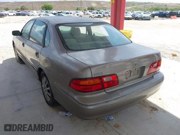 1998 Toyota Avalon XL with VIN 4T1BF18B7WU227251, listed as a IAAI auction lot 42213628 with 188,120 mi miles and . Bid and sale history available at DreamBid. Image 3.