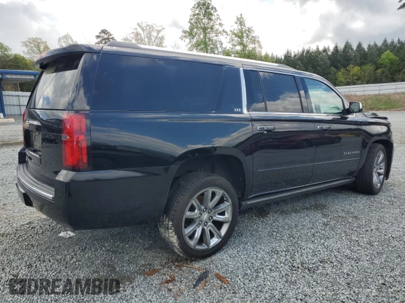 2015 Chevrolet Suburban LTZ with VIN 1GNSKKKC4FR119803, listed as a Copart auction lot 51416775 with 135,366 mi miles and Salvage Title. Bid and sale history available at DreamBid. Image 3.