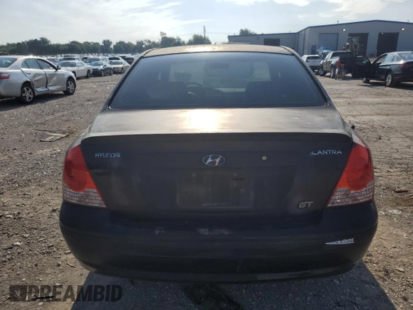 2004 Hyundai Elantra GLS z VIN KMHDN46D94U917890, wystawiony jako Copart lot #60000025 z przebiegiem 158 474 mil mil oraz Czysty tytuł • Clean title. Historia ofert i sprzedaży dostępna na DreamBid. Obrazek 6.