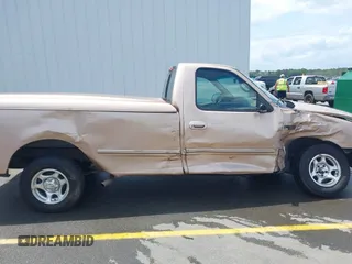 1997 Ford F-150 with VIN 1FTDF17W9VNA84250, listed as a IAAI auction lot 42149320 with 85,297 mi miles and . Bid and sale history available at DreamBid. Image 13.