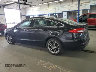 2020 Ford Fusion Titanium with VIN 3FA6P0RUXLR182408, listed as a Copart auction lot 56897105 with 100,021 mi miles and Salvage title. Bid and sale history available at DreamBid. Image 2.