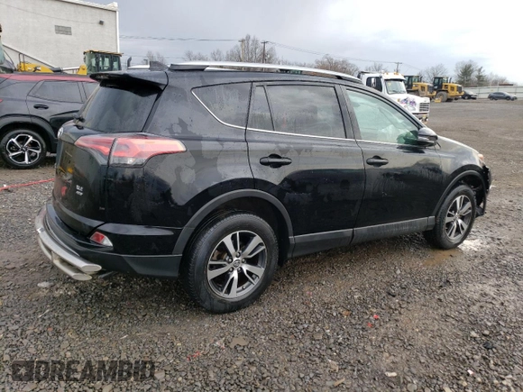 2018 Toyota RAV4 XLE with VIN 2T3RFREV6JW735352, listed as a Copart auction lot 46938025 with 73,229 mi miles and Salvage title. Bid and sale history available at DreamBid. Image 3.