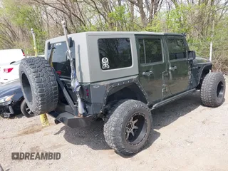 2007 Jeep Wrangler Unlimited X with VIN 1J4GA39147L101084, listed as a IAAI auction lot 41988628 with 194,562 mi miles and . Bid and sale history available at DreamBid. Image 4.