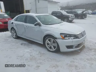 2014 Volkswagen Passat TDI SEL Premium with VIN 1VWCN7A30EC051744, listed as a IAAI auction lot 41630291 with 180,270 mi miles. Bid and sale history available at carsss.com. Image 1.