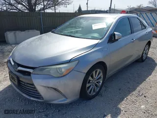 2015 Toyota Camry Hybrid LE with VIN 4T1BD1FKXFU159875, listed as a IAAI auction lot 42041323 with 240,779 mi miles. Bid and sale history available at carsss.com. Image 2.