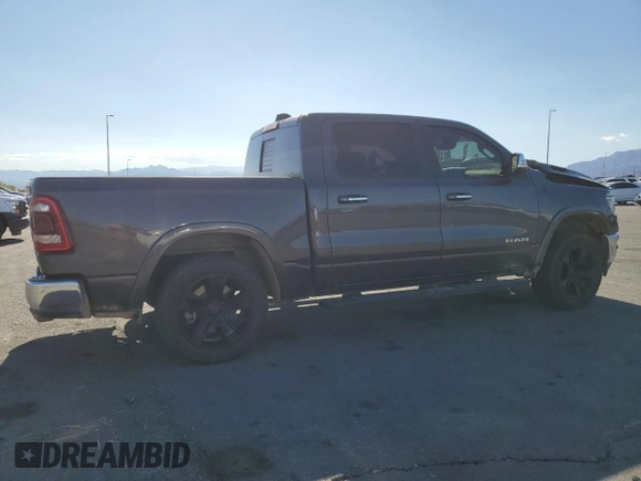 2020 Ram 1500 Laramie with VIN 1C6RREJT5LN139087, listed as a Copart auction lot 56407905 with 122,899 mi miles and Salvage title. Bid and sale history available at DreamBid. Image 3.