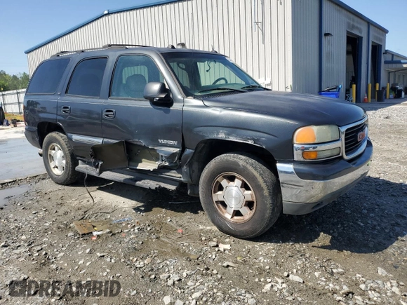 2005 GMC Yukon SLT z VIN 1GKEC13TX5R106956, wystawiony jako Copart lot #52486205 z przebiegiem 317 375 mil mil oraz Szkoda całkowita • Salvage title. Historia ofert i sprzedaży dostępna na DreamBid. Obrazek 4.