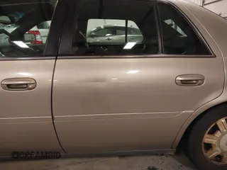 2004 Cadillac DeVille z VIN 1G6KD54Y04U119341, wystawiony jako IAAI lot #42193664 z przebiegiem 162 290 mil mil oraz . Historia ofert i sprzedaży dostępna na DreamBid. Obrazek 19.