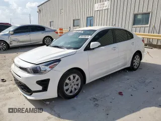 2023 Kia Rio S with VIN 3KPA24AD7PE549736, listed as a Copart auction lot 50428615 with 34,431 mi miles and Salvage Title. Bid and sale history available at carsss.com. Image 1.