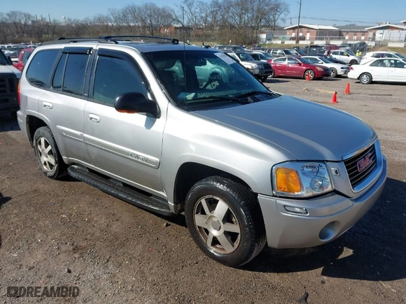 2004 GMC Envoy SLE with VIN 1GKDT13S042337388, listed as a IAAI auction lot 41756816 with 309,789 mi miles. Bid and sale history available at carsss.com. Image 1.