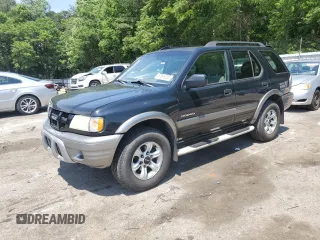 2003 Isuzu Rodeo z VIN 4S2CK58W734311374, wystawiony jako Copart lot #57949325 z przebiegiem 247 580 mil mil oraz Tytuł czysty. Historia ofert i sprzedaży dostępna na DreamBid. Obrazek 1.