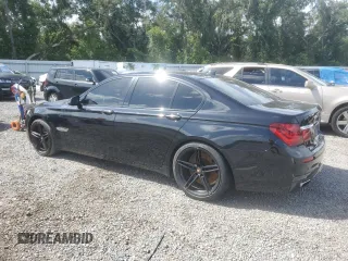 2013 BMW 7 Series 750i with VIN WBAYA8C58DC996431, listed as a Copart auction lot 70366064 with 106,580 mi miles and Salvage Title. Bid and sale history available at DreamBid. Image 2.