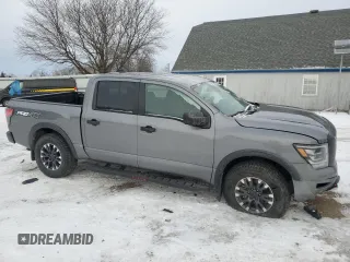 2024 Nissan Titan Pro-4X with VIN 1N6AA1ED1RN115335, listed as a Copart auction lot 42597585 with 5,381 mi miles and Salvage title. Bid and sale history available at DreamBid. Image 4.