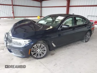 2019 BMW 5 Series 530e with VIN WBAJA9C50KB254535, listed as a IAAI auction lot 41094049 with 57,874 mi miles and . Bid and sale history available at DreamBid. Image 2.