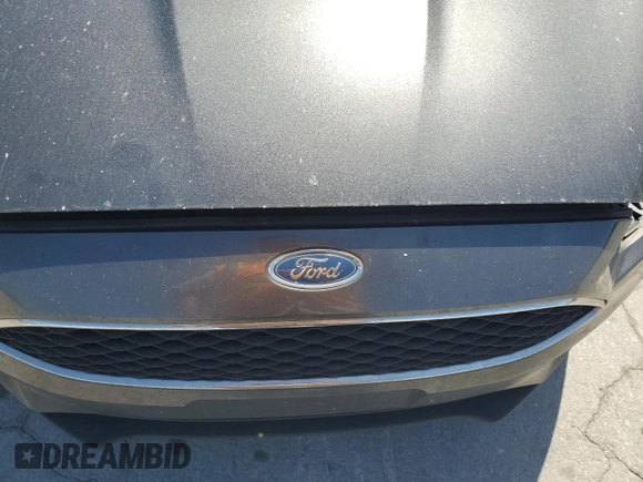 2018 Ford Focus SE with VIN 1FADP3F25JL214690, listed as a Copart auction lot 53538425 with 139,650 mi miles and Salvage title. Bid and sale history available at DreamBid. Image 12.