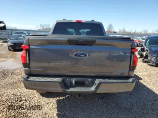 2023 Ford F-150 Lightning Pro with VIN 1FTVW1EL8PWG10894, listed as a Copart auction lot 50988655 with 34,020 mi miles and Salvage Title. Bid and sale history available at DreamBid. Image 6.