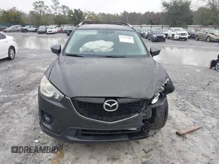 2015 Mazda CX-5 Touring with VIN JM3KE2CY4F0435563, listed as a IAAI auction lot 41311988 with 187,183 mi miles. Bid and sale history available at carsss.com. Image 12.