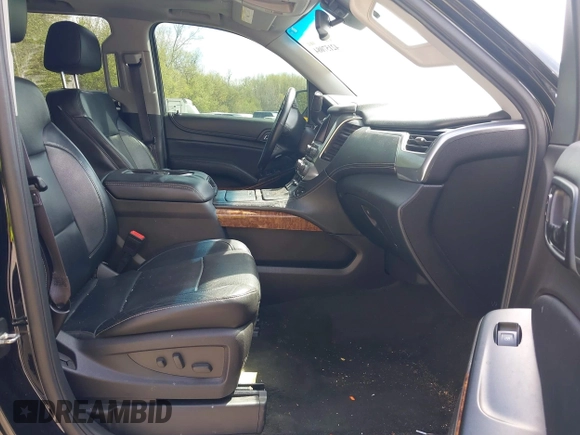 2015 Chevrolet Tahoe LTZ with VIN 1GNSKCKC8FR514671, listed as a IAAI auction lot 42157084 with 182,665 mi miles and . Bid and sale history available at DreamBid. Image 5.