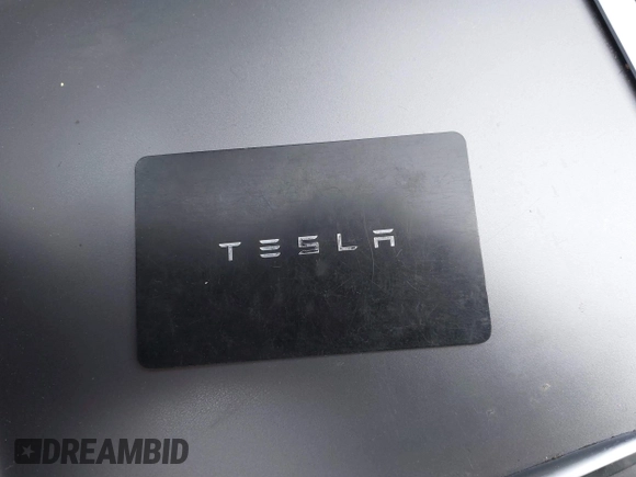 2021 Tesla Model Y Long Range with VIN 5YJYGDEE6MF209034, listed as a IAAI auction lot 41896238 with 53,401 mi miles. Bid and sale history available at carsss.com. Image 11.