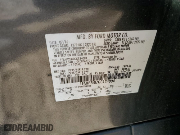 2016 Ford Taurus SEL with VIN 1FAHP2E87GG134004, listed as a Copart auction lot 59764905 with 145,169 mi miles and Salvage title. Bid and sale history available at DreamBid. Image 12.