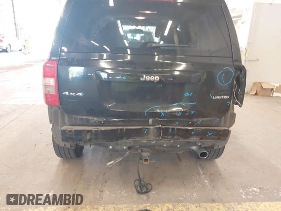 2014 Jeep Patriot Limited with VIN 1C4NJRCB4ED629085, listed as a IAAI auction lot 39414215 with 87,409 mi miles. Bid and sale history available at carsss.com. Image 6.