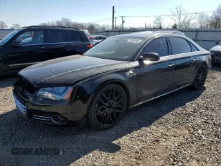 2014 Audi A8 4.0T with VIN WAUR2AFDXEN005361, listed as a Copart auction lot 46828285 with 106,984 mi miles and Salvage Title. Bid and sale history available at DreamBid. Image 1.
