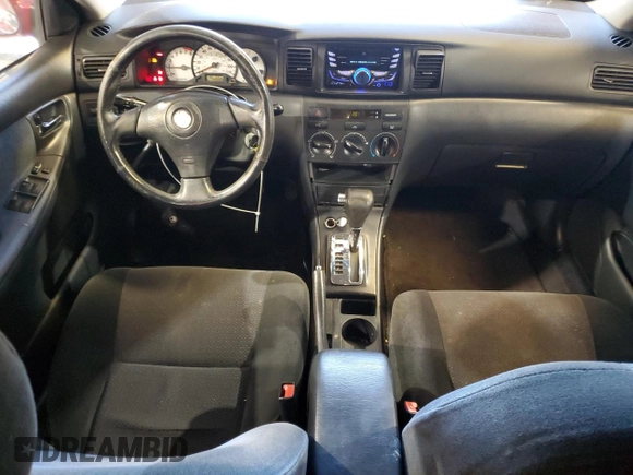 2003 Toyota Corolla CE with VIN 1NXBR32E63Z161048, listed as a Copart auction lot 83226694 with 299,999 mi miles and Salvage Title. Bid and sale history available at DreamBid. Image 8.
