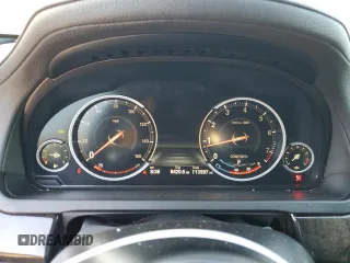 2015 BMW 7 Series 740Li with VIN WBAYE4C59FD139044, listed as a Copart auction lot 75907584 with 113,587 mi miles and Salvage Title. Bid and sale history available at DreamBid. Image 9.