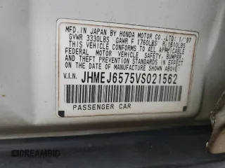 1997 Honda Civic LX z VIN JHMEJ6575VS021562, wystawiony jako Copart lot #54743805 z przebiegiem 133 886 mil mil oraz Szkoda całkowita • Salvage title. Historia ofert i sprzedaży dostępna na DreamBid. Obrazek 12.