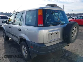 2000 Honda CR-V LX with VIN JHLRD184XYC054038, listed as a IAAI auction lot 41414445 with 294,210 mi miles. Bid and sale history available at carsss.com. Image 3.