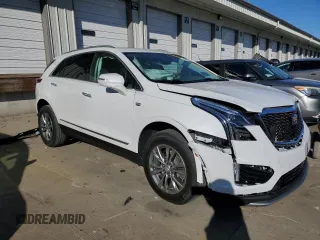 2021 Cadillac XT5 FWD Premium Luxury with VIN 1GYKNCRS0MZ198199, listed as a Copart auction lot 83595494 with 27,923 mi miles and Salvage Title. Bid and sale history available at carsss.com. Image 4.