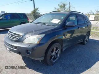 2007 Lexus RX 400h z VIN JTJGW31U372003129, wystawiony jako IAAI lot #41769911 z przebiegiem 231 097 mil mil oraz . Historia ofert i sprzedaży dostępna na DreamBid. Obrazek 2.